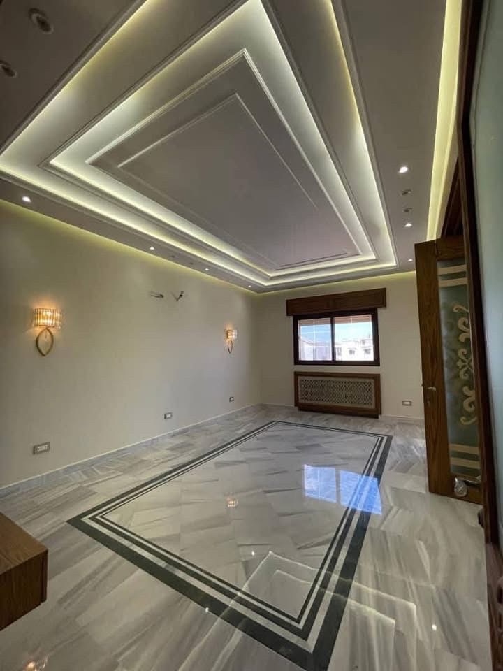 شقة للبيع في جمعية الزهراء ضمن بناء حديث وفاخر - صورة 4