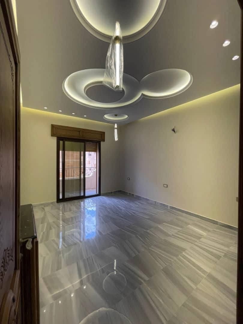 شقة للبيع في جمعية الزهراء ضمن بناء حديث وفاخر - صورة 8